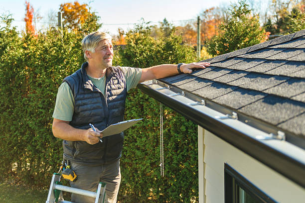 Professional Flat Roof Repair technician working in Elyria, OH